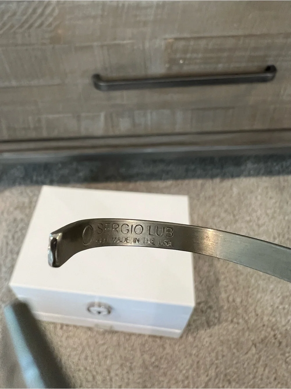 Sergio Lub gold tone “peace” and silver tone “love” cuff bracelets, extra small